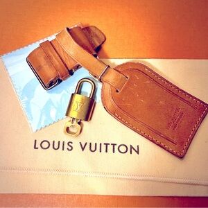 Authentic Louis Vuitton lock and key luggage tag and holder pre-loved